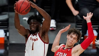No. 24 USC holds off Utah 91-85 in double overtime at Pac-12