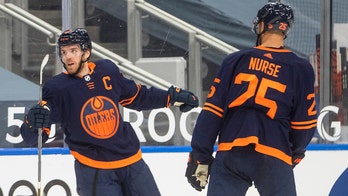 McDavid scores twice, Oilers beat Jets to tie for North lead