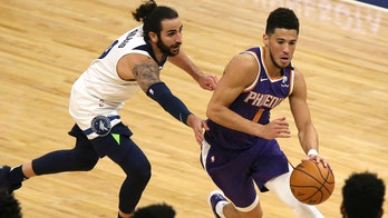 Booker scores 43 points, surging Suns beat T-wolves 118-99