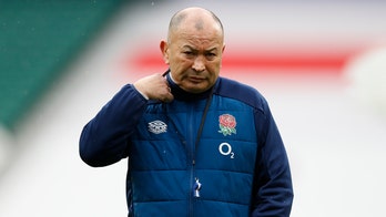 England's rugby coach slams media, accuses it of putting 'rat poison' into players' heads