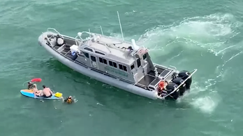 Florida authorities rescue kids found floating on paddleboard a mile off the coast