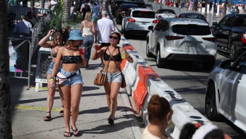 Health experts warn of new coronavirus spike as states ease restrictions, spring break travel surges