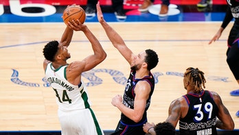 Antetokounmpo lifts Bucks to 109-105 OT victory over 76ers