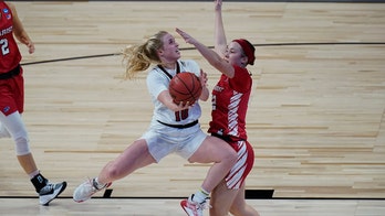 Louisville overcomes slow start to beat Marist 74-43