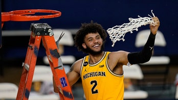 No. 2 Michigan clinches Big Ten, beats Michigan State 69-50