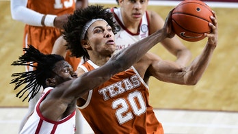 Sims leads No. 15 Texas past No. 16 Oklahoma 69-65