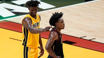 Butler scores 28, Heat stay hot with 113-98 win over Cavs