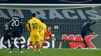 PSG draws 1-1 with wasteful Barcelona to reach CL quarters