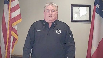 Georgia deputy dies from wounds; 2 suspects charged with murder