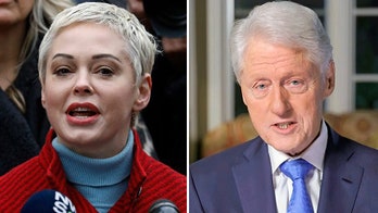 Rose McGowan accuses Twitter of 'trying to silence me' by suspending her over tweet attacking Bill Clinton