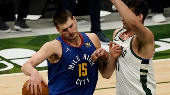 Jokic's triple-double leads Nuggets to 128-97 rout of Bucks