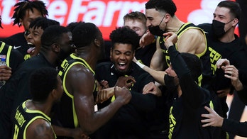 Oregon clinches Pac-12 title with 80-67 over Oregon State