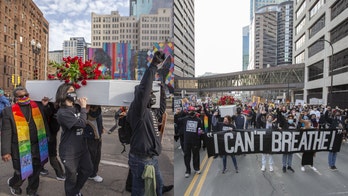 Minneapolis protesters carry casket, march through city on eve of Chauvin trial