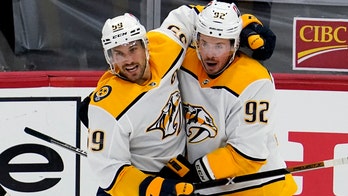 Josi lifts Predators past Blackhawks 3-2 for 5th straight