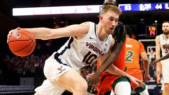 Hauser helps No. 21 Virginia end skid, beat Miami 62-51