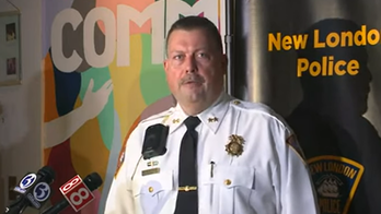 Connecticut top cop holds back tears after announcing mother's arrest for killing young son, 'take me away'