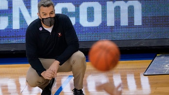 Stuck in quarantine, Virginia has spot in tournament waiting