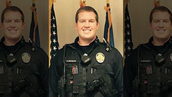 Arizona police officer wounded in shootout is ID'd, remains hospitalized