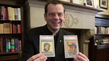 Minnesota priest sells baseball card collection to fund Catholic school scholarships