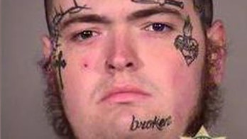 Portland riot suspect, 22, accused of punching officer, vandalism; arrested twice in one night