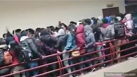 Horrific video shows Bolivian university students falling to their death after metal rail collapses