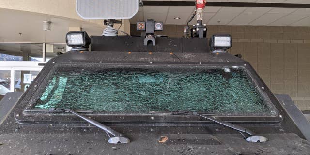 A police vehicle was damaged during a massive street party.