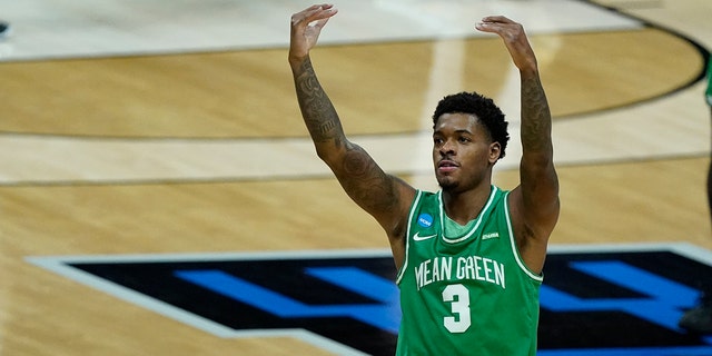 North Texas's Javion Hamlet reacts to fans during the first half of a first-round game against Purdue in the NCAA men's college basketball tournament at Lucas Oil Stadium, Friday, March 19, 2021, in Indianapolis. (Associated Press)