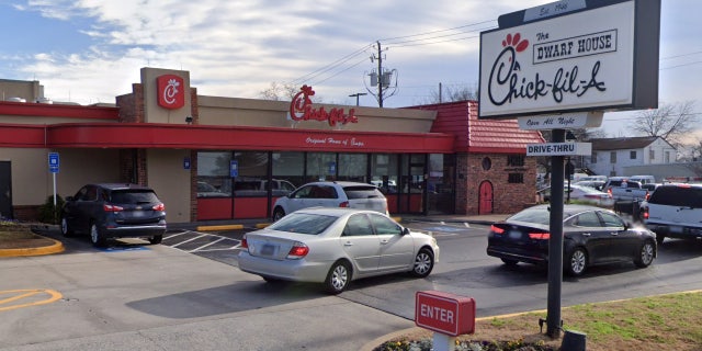The tiny red door near the current entrance — seen in the right of the photograph — will still be in place after the remodel, the digital rendering suggests.
