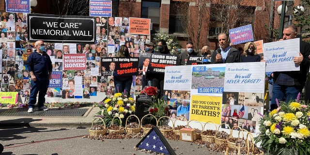 Protesters against Gov. Andrew Cuomo's handling of nursing homes COVID-19 deaths, gather outside Cobble Hill Health Center nursing home on Sunday, March 21, 2021 in New York. (AP Photo/David Crary)