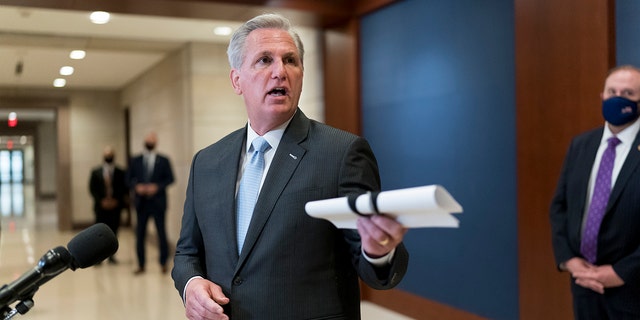 House Minority Leader Kevin McCarthy criticizes the Democrats' $1.9 trillion COVID-19 relief bill on Capitol Hill, Feb. 24, 2021. (AP Photo/J. Scott Applewhite)