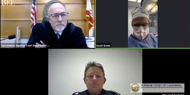 Zoom video conference collage captured by The Sacramento Bee, shows Dr. Scott Green who appeared Thursday, Feb. 25, 2021, for his Sacramento Superior Court trial, held virtually because of the coronavirus pandemic, from an operating room in Sacramento, Calif. (Superior Court of California/Sacramento Bee via AP)