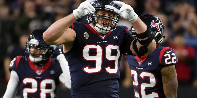 Former Houston Texans defensive end J.J. Watt (99) celebrates during the second half of an NFL wild-card playoff football game against the Buffalo Bills in Houston, on Jan. 4, 2020. (Associated Press)