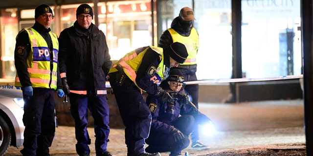 Police are seen in the area after several people were attacked in Vetlanda, Sweden, Wednesday, March 3, 2021. (Mikael Fritzon/TT News Agency via AP)