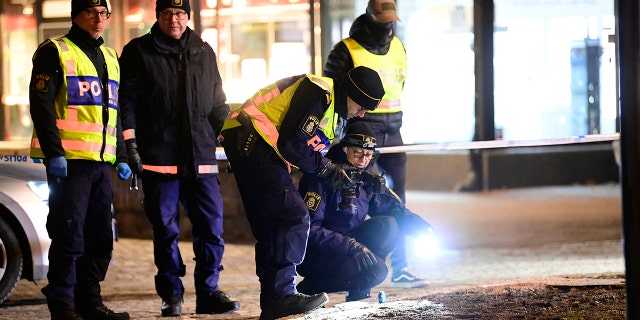 Police are seen in the area after several people were attacked in Vetlanda, Sweden, Wednesday, March 3, 2021. (Mikael Fritzon/TT News Agency via AP)