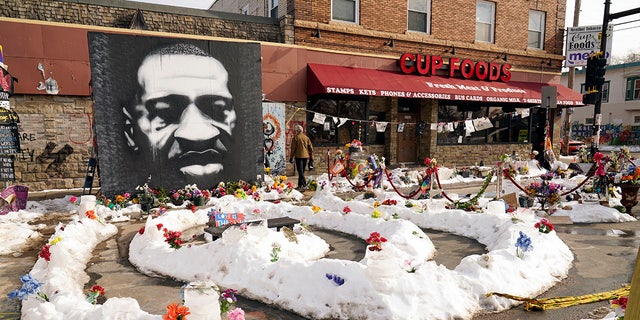George Floyd Square is shown on Feb. 8, 2021, in Minneapolis. Ten months after police officers brushed off George Floyd's moans for help on the street outside a south Minneapolis grocery, the square remains a makeshift memorial for Floyd. (AP Photo/Jim Mone)