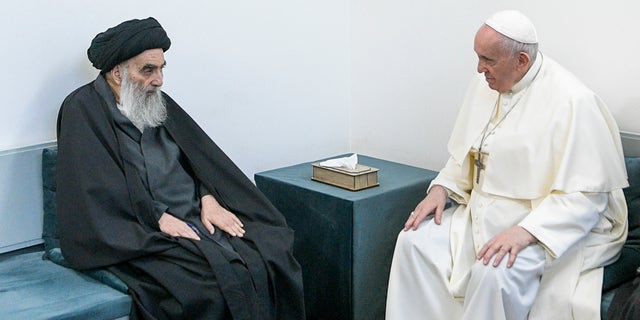 Pope Francis, right, meets with Iraq's leading Shiite cleric, Grand Ayatollah Ali al-Sistani in Najaf, Iraq, Saturday, March 6, 2021. The closed-door meeting was expected to touch on issues plaguing Iraq's Christian minority. Al-Sistani is a deeply revered figure in Shiite-majority Iraq and and his opinions on religious matters are sought by Shiites worldwide. (AP Photo/Vatican Media)