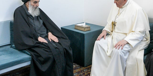 Pope Francis, right, meets with Iraq's leading Shiite cleric, Grand Ayatollah Ali al-Sistani in Najaf, Iraq, Saturday, March 6, 2021. The closed-door meeting was expected to touch on issues plaguing Iraq's Christian minority. Al-Sistani is a deeply revered figure in Shiite-majority Iraq and and his opinions on religious matters are sought by Shiites worldwide. (AP Photo/Vatican Media)