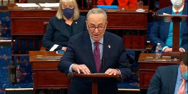 FILE: Senate Majority Leader Chuck Schumer of N.Y., speaks before the final vote on the Senate version of the COVID-19 relief bill in the Senate at the U.S. Capitol in Washington, Saturday, March 6, 2021.