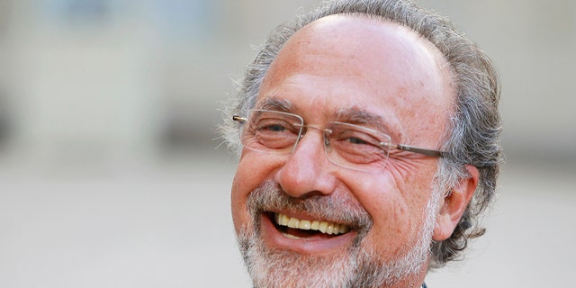 French member of parliament Olivier Dassault smiles in Paris on Sept 1, 2014. (AP Photo/Jacques Brinon, File)