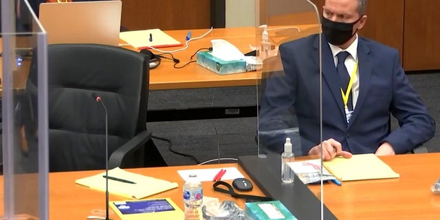 In this image from video, defendant, former Minneapolis police officer Derek Chauvin, right, listen as Hennepin County Judge Peter Cahill presides over pretrial motions before jury selection, Monday, March 8, 2021, in the trial of former officer Chauvin, in the May 25, 2020, death of George Floyd at the Hennepin County Courthouse in Minneapolis, Minn. (Court TV, via AP, Pool)