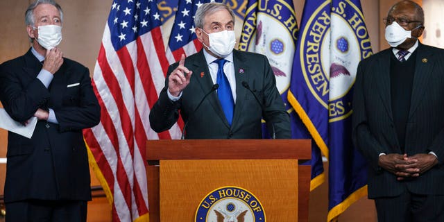 House Budget Committee Chairman John Yarmuth, D-Ky., center, is flanked by Ways and Means Committee Chairman Richard Neal, D-Mass., left, and Majority Whip James Clyburn, D-S.C., at a news conference ahead of the vote on the Democrat's $1.9 trillion COVID-19 relief bill, at the Capitol in Washington, Tuesday, March 9, 2021.