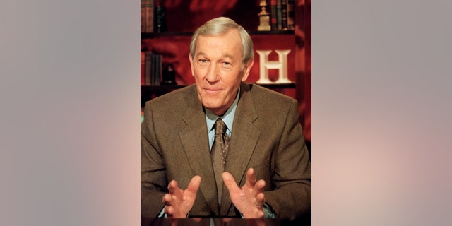 FILE - In this Aug. 6, 2001, file photo, veteran journalist Roger Mudd tapes a segment for the History Channel at CBS studios in New York. Mudd, the longtime political correspondent and anchor for NBC and CBS who once stumped Sen. Edward Kennedy by simply asking why he wanted to be president, died Tuesday, March 9, 2021. He was 93. (AP Photo/Marty Lederhandler, File)