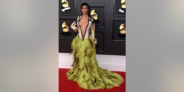 Doja Cat rocked a Roberto Cavalli gown. (Photo by Jordan Strauss/Invision/AP)