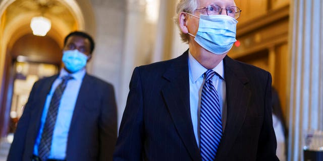 Senate Minority Leader Mitch McConnell, R-Ky., leaves the chamber after criticizing Democrats for wanting to change the filibuster rule, at the Capitol in Washington, Tuesday, March 16, 2021.