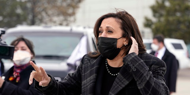 Vice President Kamala Harris listens to a question from the press before she boards Air Force Two in Denver, Tuesday March 16, 2021, to return to Washington. (AP Photo/Jacquelyn Martin)