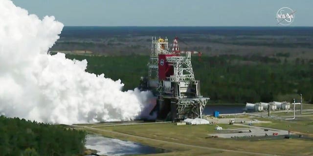 In this image from video made available by NASA, the core stage of the Space Launch System, NASA’s planned moon rocket, is tested at the Stennis Space Center near Bay St. Louis, Miss., on Thursday, Mar. 18, 2021. - AP21077770966304 - Biden keeps Trump’s National Space Council