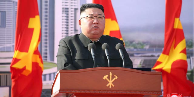 North Korean leader Kim Jong Un speaks during a ceremony to break ground for building 10,000 homes, in Pyongyang, North Korea, Tuesday, March 23, 2021. 