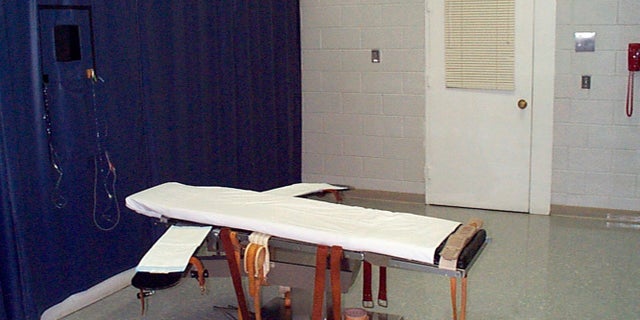 This undated file photo provided by the Virginia Department of Corrections shows the execution chamber at the Greensville Correctional Center in Jarratt, Va. Virginia Gov. Ralph Northam scheduled a tour Wednesday, March 24, 2021, of the death chamber at the Greensville Correction Center, then planned to sign the landmark legislation. (Virginia Department of Corrections via AP, File)