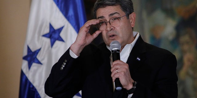 Honduran President Juan Orlando Hernandez speaks during a press conference at the Presidential House in Tegucigalpa, Honduras, Wednesday, March 24, 2021. Hernandez denied any wrongdoing after his name has come up repeatedly in the trial of alleged drug trafficker Geovanny Fuentes Ramirez in New York, as U.S. prosecutors continue to argue that Hernandez's political rise was fueled by drug traffickers. (AP Photo/Elmer Martinez)