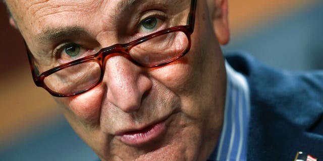 Senate Majority Leader Chuck Schumer of New York, holds a news conference, Thursday, March 25, 2021 on Capitol Hill in Washington.